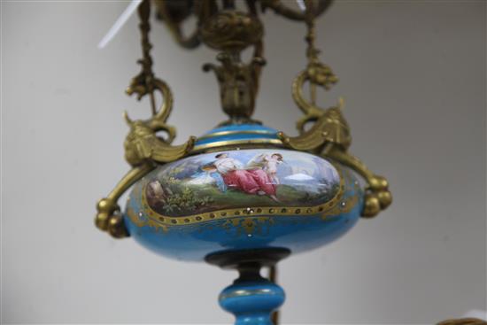 A pair of Sevres style porcelain and ormolu mounted table lamps, late 19th century, total height 60cm